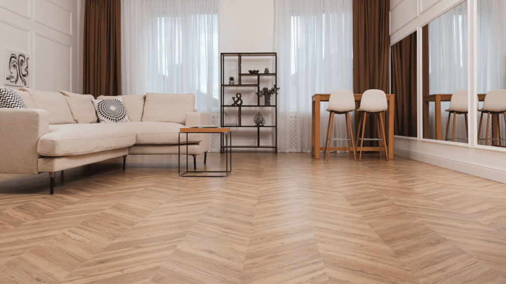 Living room with wood floor in herringbone pattern